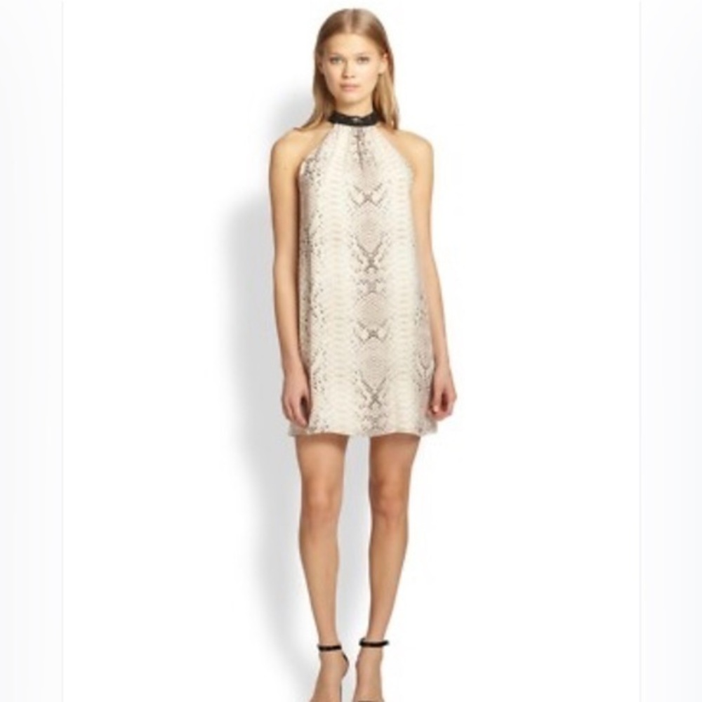 Haute Hippi Sleeveless snakeskin
Choker Mini Dress. Fully lined size small .